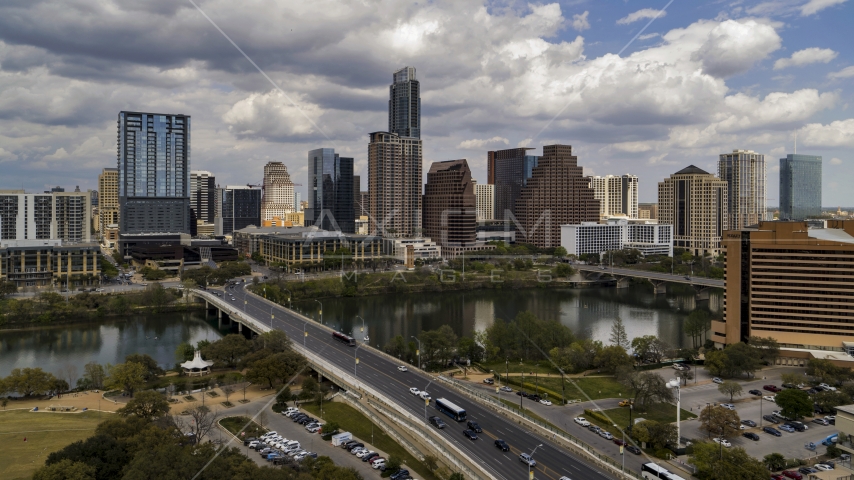 The city's skyline seen from First Street Bridge and Lady Bird Lake, Downtown Austin, Texas Aerial Stock Photo DXP002_102_0001 | Axiom Images
