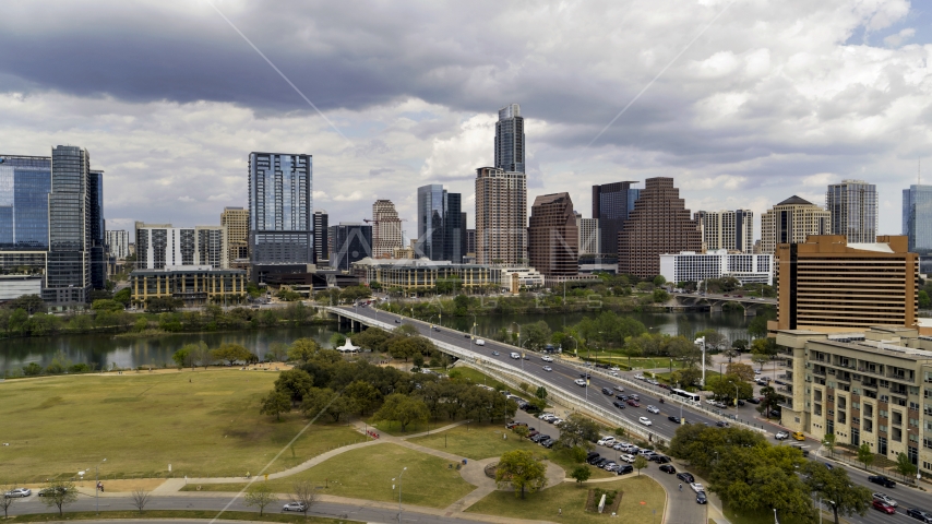 The city's skyline seen from First Street Bridge and Lady Bird Lake, Downtown Austin, Texas Aerial Stock Photo DXP002_102_0006 | Axiom Images