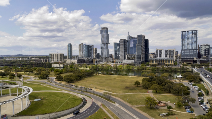A view of the city skyline across Lady Bird Lake in Downtown Austin, Texas Aerial Stock Photo DXP002_102_0010 | Axiom Images