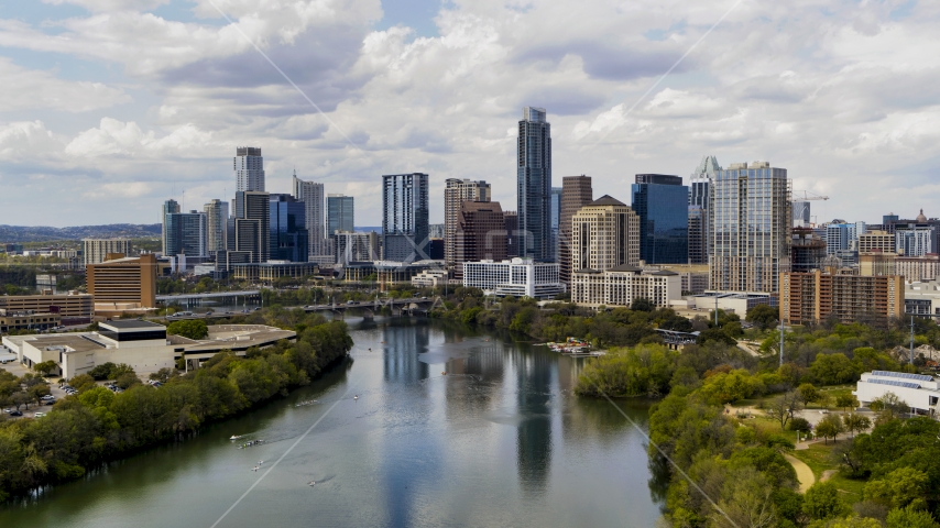 The city skyline from Lady Bird Lake, Downtown Austin, Texas Aerial Stock Photo DXP002_102_0017 | Axiom Images