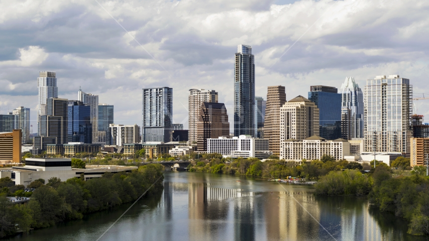 Lady Bird Lake and skyscrapers in Downtown Austin, Texas Aerial Stock Photo DXP002_103_0001 | Axiom Images