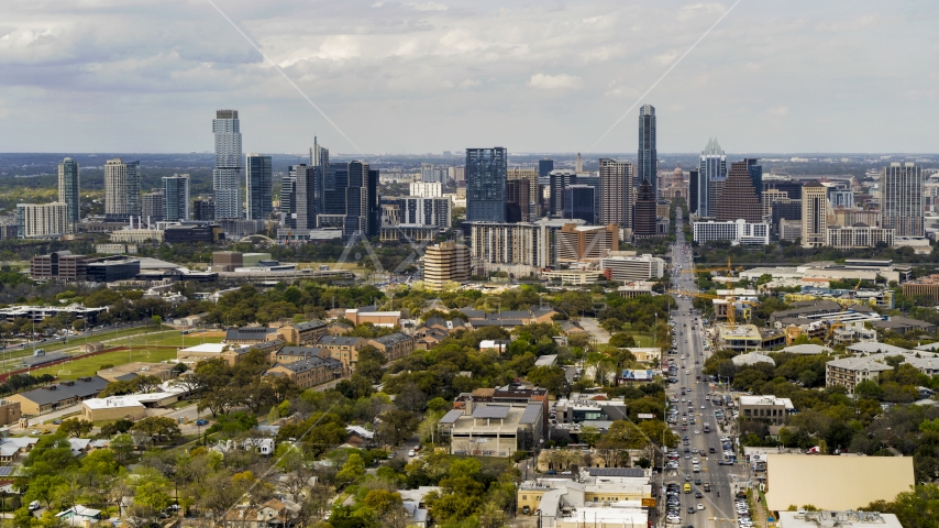 A wide view of the city's skyline from Congress Avenue in Downtown Austin, Texas Aerial Stock Photo DXP002_103_0011 | Axiom Images