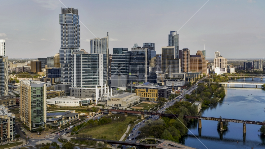 Skyscrapers, and bridges spanning Lady Bird Lake, Downtown Austin, Texas Aerial Stock Photo DXP002_104_0001 | Axiom Images