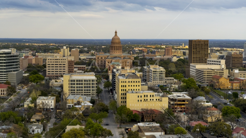 The Texas State Capitol building at sunset in Downtown Austin, Texas Aerial Stock Photo DXP002_104_0011 | Axiom Images