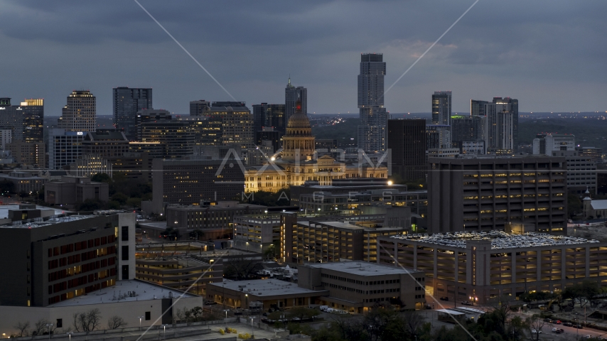 Office buildings, capitol and skyscrapers at twilight in Downtown Austin, Texas Aerial Stock Photo DXP002_105_0021 | Axiom Images
