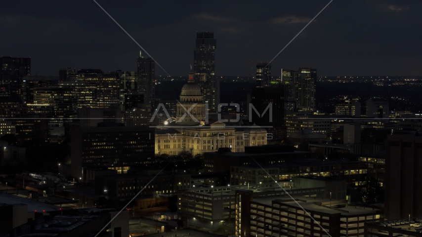 A view of the Texas State Capitol at night in Downtown Austin, Texas Aerial Stock Photo DXP002_106_0002 | Axiom Images
