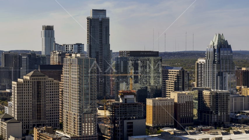 City skyscrapers around The Austonian in Downtown Austin, Texas Aerial Stock Photo DXP002_108_0008 | Axiom Images