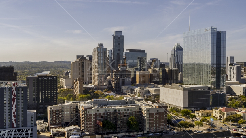 A view of tall skyscrapers and hotel high-rise in Downtown Austin, Texas Aerial Stock Photo DXP002_108_0013 | Axiom Images