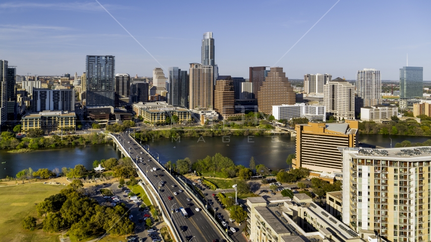 A view of the city's waterfront skyline, seen from apartment building and hotel, Downtown Austin, Texas Aerial Stock Photo DXP002_109_0015 | Axiom Images