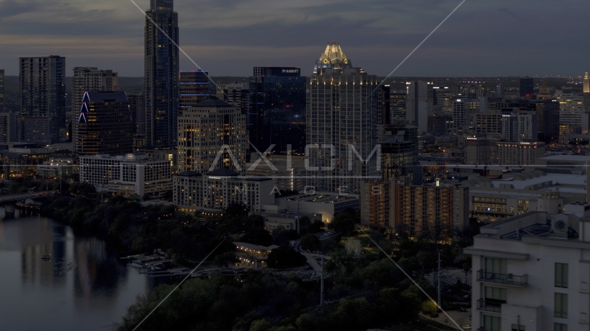 San Jacinto Center at twilight in Downtown Austin, Texas Aerial Stock Photo DXP002_110_0020 | Axiom Images