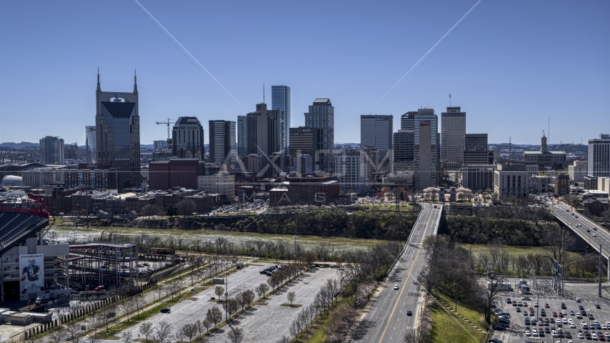 The city's skyline near the river in Downtown Nashville, Tennessee Aerial Stock Photo DXP002_112_0001 | Axiom Images