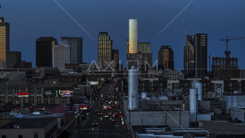 Church Street and view of city's skyline at twilight in Downtown Nashville, Tennessee Aerial Stock Photo DXP002_115_0003 | Axiom Images
