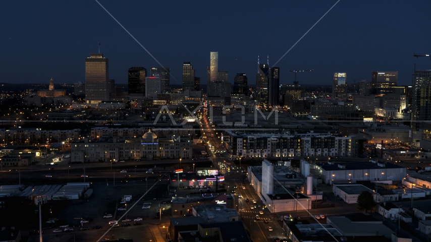 Wide view of traffic on Church Street and city skyline, Downtown Nashville, Tennessee Aerial Stock Photo DXP002_115_0011 | Axiom Images