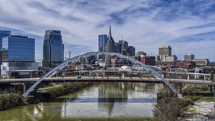 Korean War Veterans Memorial Bridge and skyscrapers in the background in Downtown Nashville, Tennessee Aerial Stock Photo DXP002_116_0005 | Axiom Images
