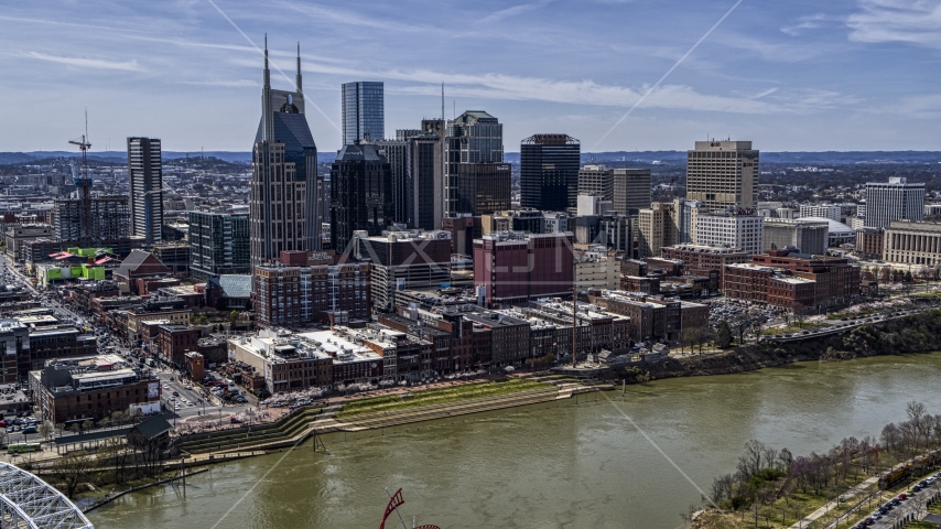 The city's skyline overlooking the Cumberland River, Downtown Nashville, Tennessee Aerial Stock Photo DXP002_117_0005 | Axiom Images