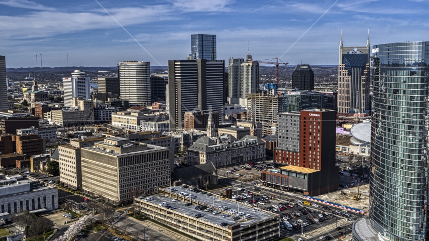 Tall skyscrapers, city buildings in Downtown Nashville, Tennessee Aerial Stock Photo DXP002_118_0003 | Axiom Images