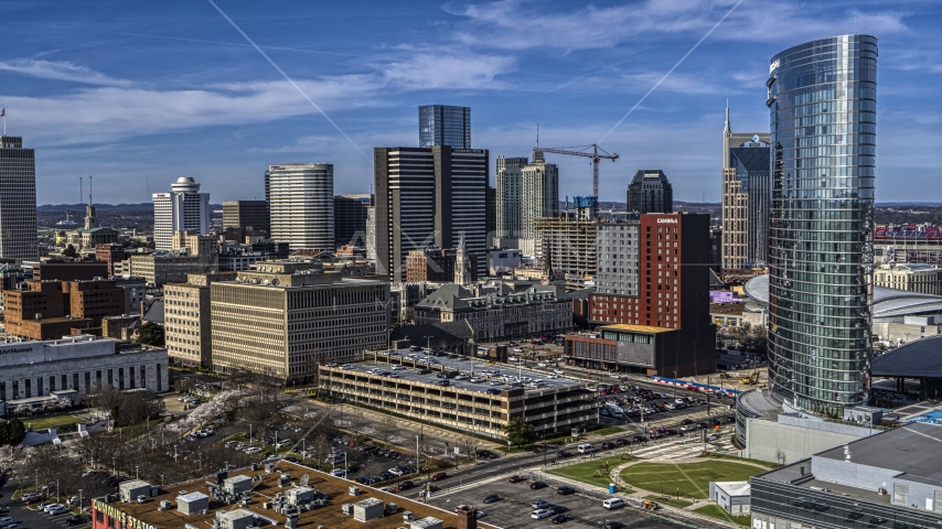 A view of tall skyscrapers and city buildings in Downtown Nashville, Tennessee Aerial Stock Photo DXP002_118_0004 | Axiom Images