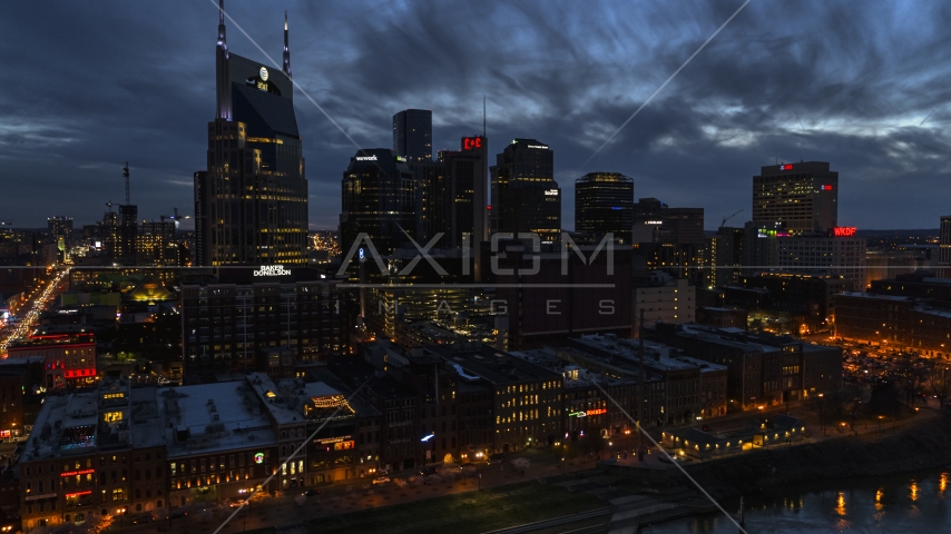 Clouds above the city's skyline at twilight, Downtown Nashville, Tennessee Aerial Stock Photo DXP002_121_0002 | Axiom Images