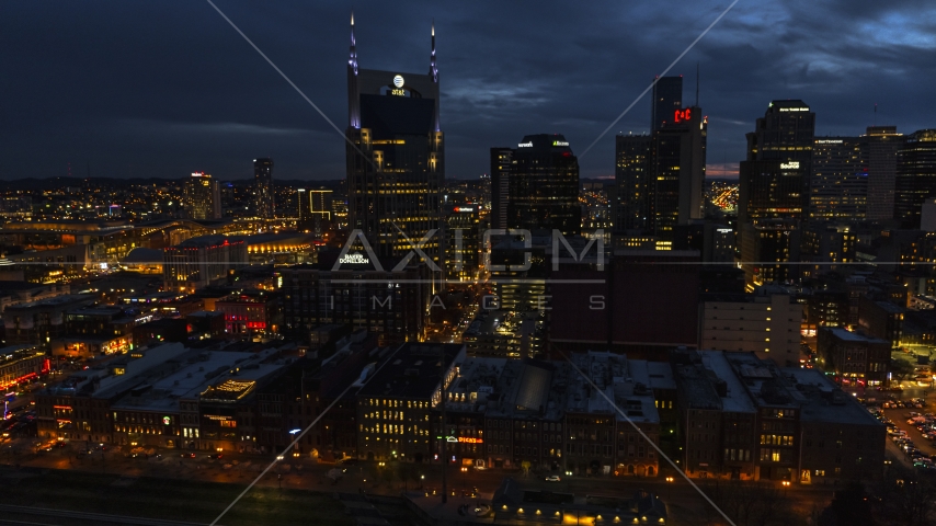 A view of the AT&T Building and skyline at twilight, Downtown Nashville, Tennessee Aerial Stock Photo DXP002_121_0006 | Axiom Images