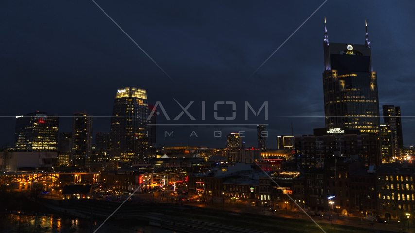 Broadway between the Pinnacle skyscraper and AT&T Building at twilight, Downtown Nashville, Tennessee Aerial Stock Photo DXP002_121_0007 | Axiom Images