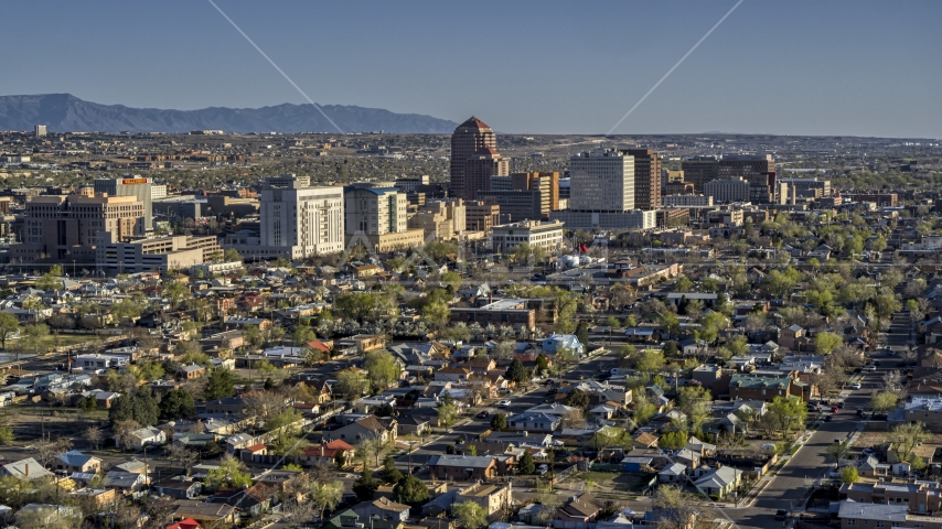The city's high-rises seen from residential neighborhoods in Downtown Albuquerque, New Mexico Aerial Stock Photo DXP002_122_0001 | Axiom Images