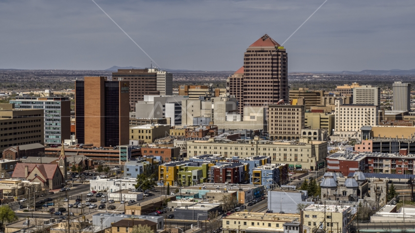 Albuquerque Plaza office high-rise and surrounding buildings, Downtown Albuquerque, New Mexico Aerial Stock Photo DXP002_124_0009 | Axiom Images