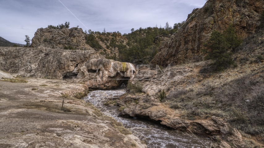Rapids flowing through a rock formation in the mountains of New Mexico Aerial Stock Photo DXP002_129_0001 | Axiom Images