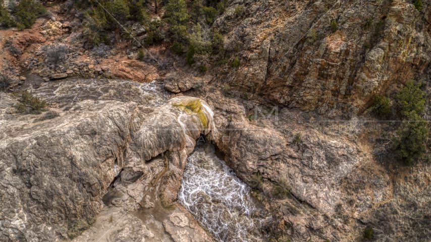 River rapids flowing through a rock formation in New Mexico Aerial Stock Photo DXP002_129_0005 | Axiom Images
