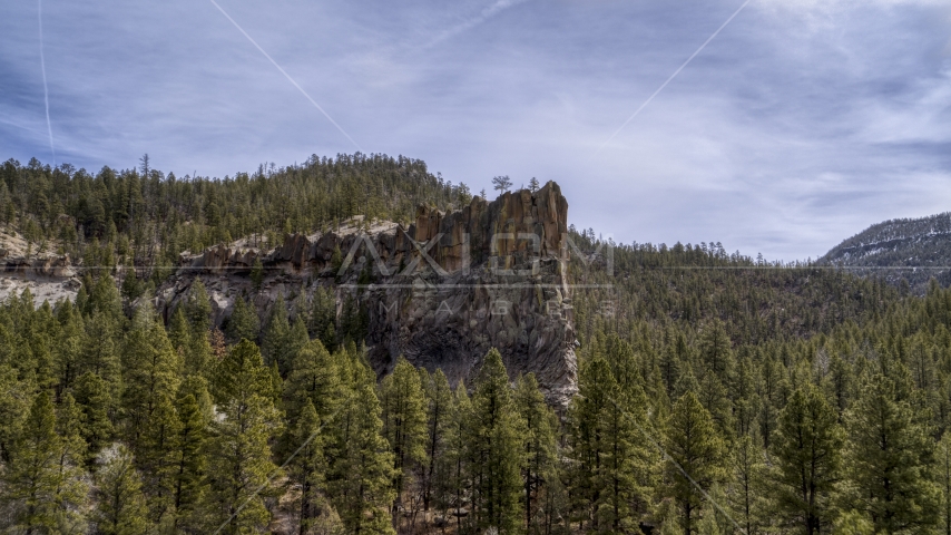 A view of a rock formation in the mountains in New Mexico Aerial Stock Photo DXP002_129_0007 | Axiom Images