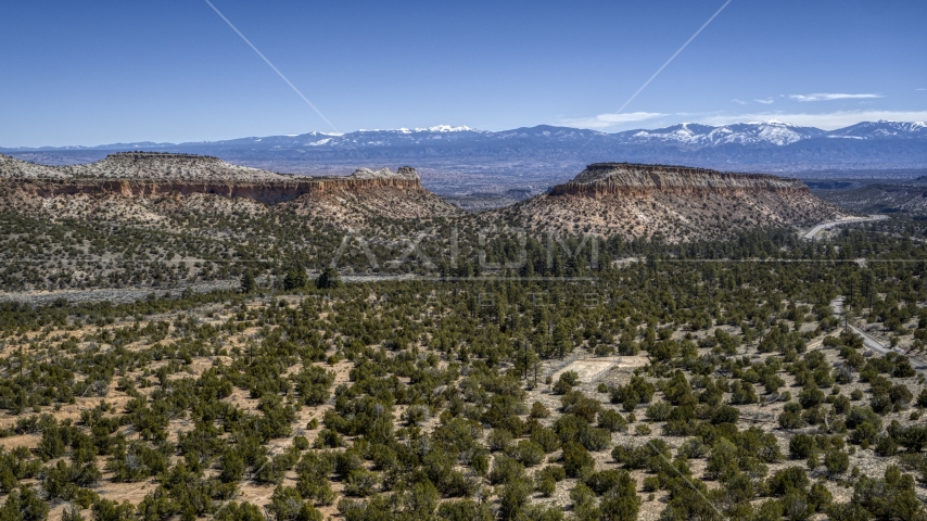A view of desert mesas in New Mexico Aerial Stock Photo DXP002_133_0001 | Axiom Images