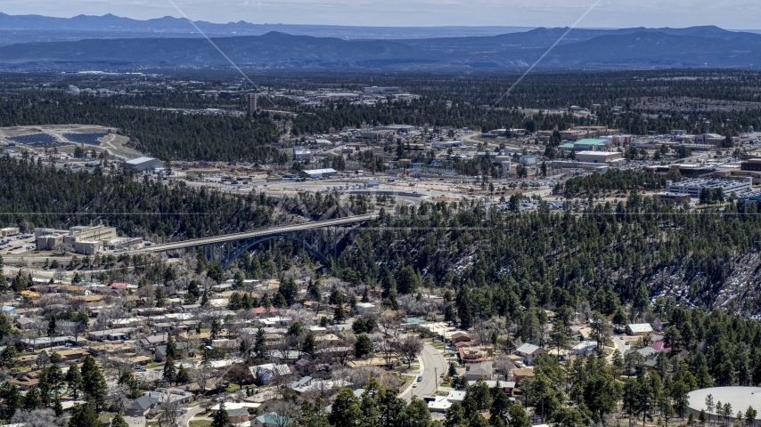 A bridge spanning the canyon to the Los Alamos National Laboratory complex, New Mexico Aerial Stock Photo DXP002_133_0015 | Axiom Images