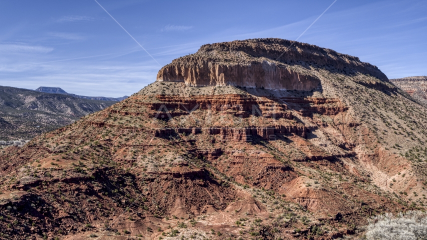 The side of a rugged butte with steep slopes, New Mexico Aerial Stock Photo DXP002_135_0006 | Axiom Images