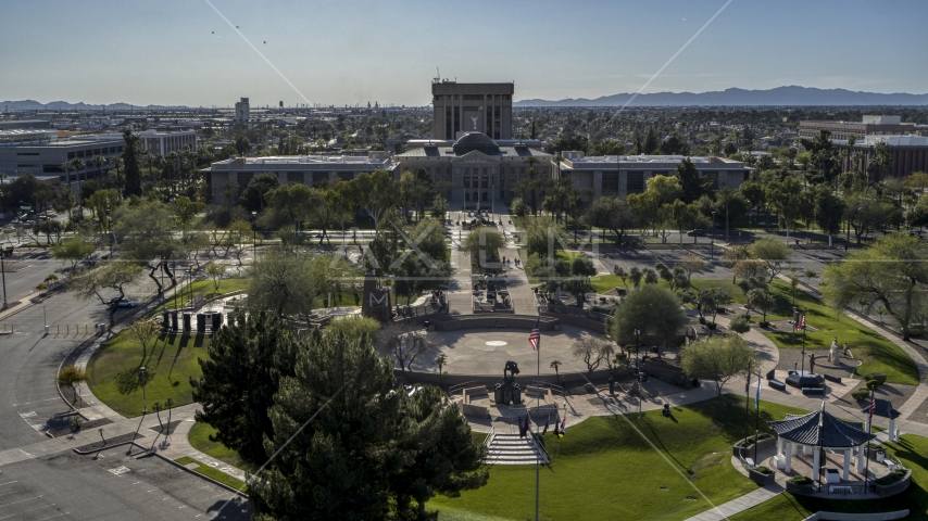 A view of a plaza and the Arizona State Capitol in Phoenix, Arizona Aerial Stock Photo DXP002_138_0002 | Axiom Images
