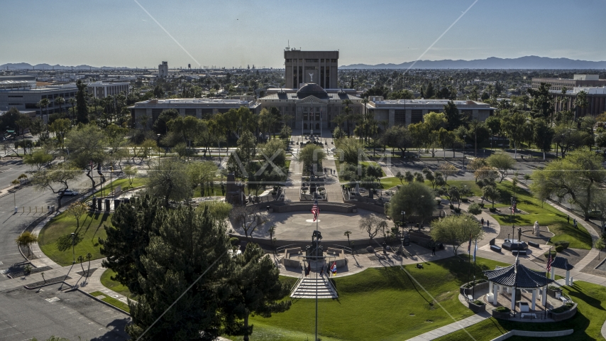 The plaza and the Arizona State Capitol on a sunny day in Phoenix, Arizona Aerial Stock Photo DXP002_138_0003 | Axiom Images