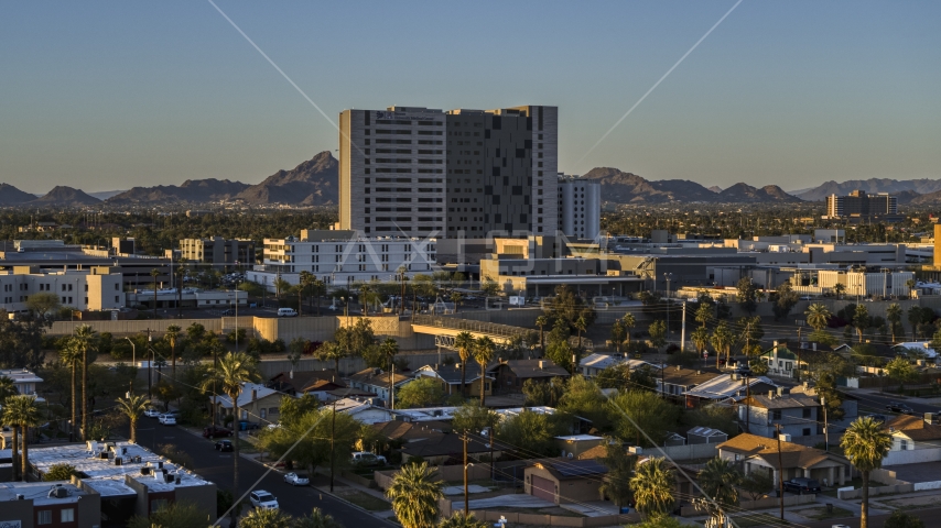 A hospital complex at sunset in Phoenix, Arizona Aerial Stock Photo DXP002_138_0013 | Axiom Images