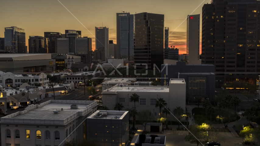 A group of high-rise office towers at sunset in Downtown Phoenix, Arizona Aerial Stock Photo DXP002_139_0004 | Axiom Images