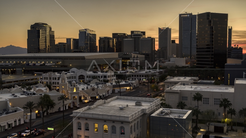 Tall high-rise office towers at sunset in Downtown Phoenix, Arizona Aerial Stock Photo DXP002_139_0005 | Axiom Images