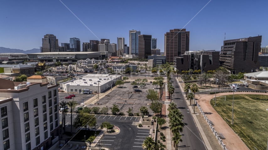 A view of the city's skyline on a sunny day in Downtown Phoenix, Arizona Aerial Stock Photo DXP002_140_0002 | Axiom Images