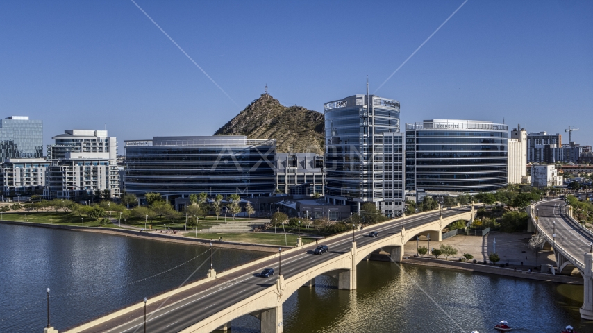 A view of modern office buildings by the reservoir in Tempe, Arizona Aerial Stock Photo DXP002_142_0002 | Axiom Images