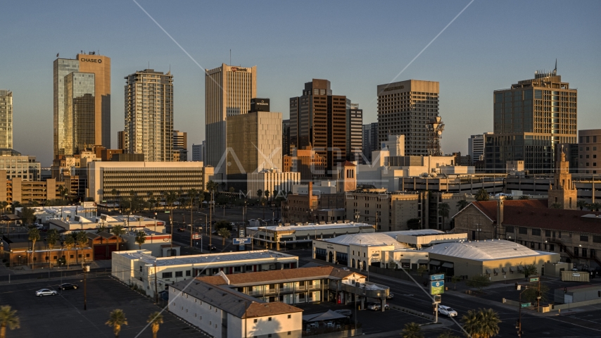 The city's tall skyline at sunset, Downtown Phoenix, Arizona Aerial Stock Photo DXP002_143_0007 | Axiom Images