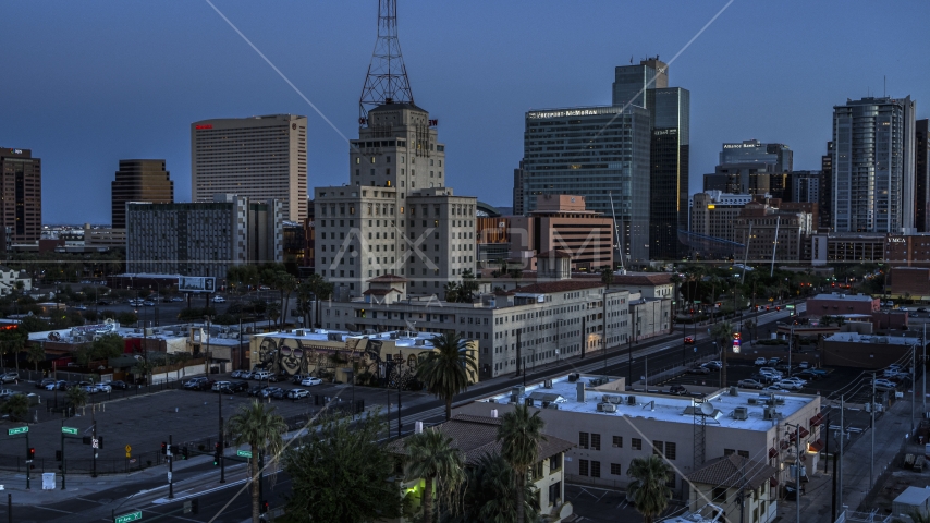 Westward Ho building and office towers at twilight, Downtown Phoenix, Arizona Aerial Stock Photo DXP002_143_0010 | Axiom Images