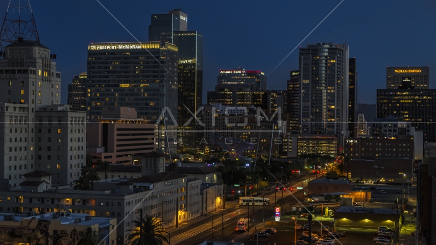 Tall high-rise office buildings near Westward Ho building at twilight, Downtown Phoenix, Arizona Aerial Stock Photo DXP002_143_0013 | Axiom Images