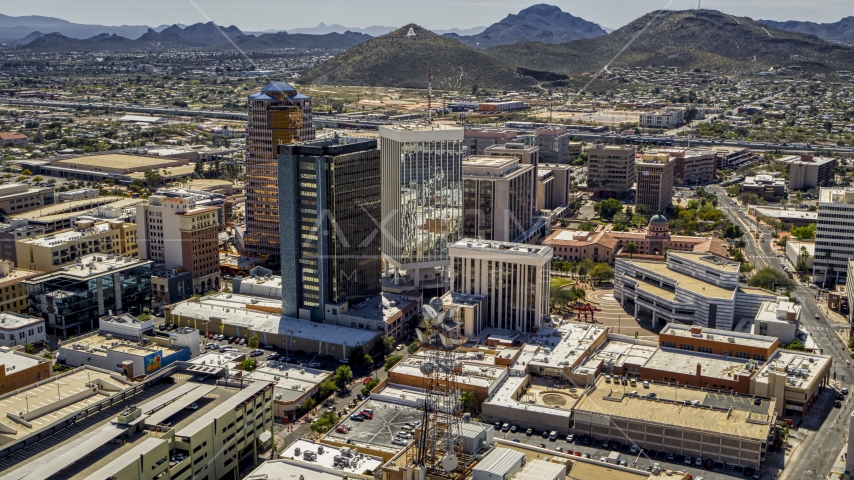Three downtown office high-rises with Sentinel Peak in the distance, Downtown Tucson, Arizona Aerial Stock Photo DXP002_144_0002 | Axiom Images