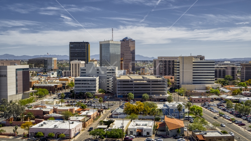 A view of a group of tall high-rise office buildings, Downtown Tucson, Arizona Aerial Stock Photo DXP002_144_0003 | Axiom Images