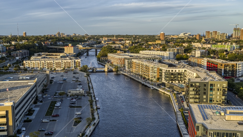 Apartment complexes by the Milwaukee River at sunset, Milwaukee, Wisconsin Aerial Stock Photo DXP002_150_0002 | Axiom Images