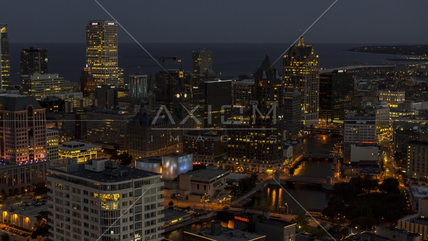 A view of skyscrapers at night, Downtown Milwaukee, Wisconsin Aerial Stock Photo DXP002_151_0002 | Axiom Images