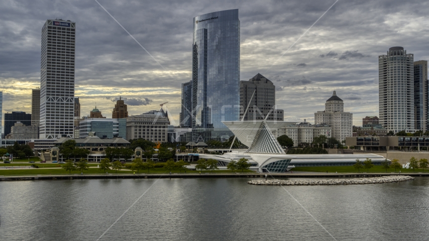 Skyscrapers and art museum by Lake Michigan in Downtown Milwaukee, Wisconsin Aerial Stock Photo DXP002_154_0003 | Axiom Images
