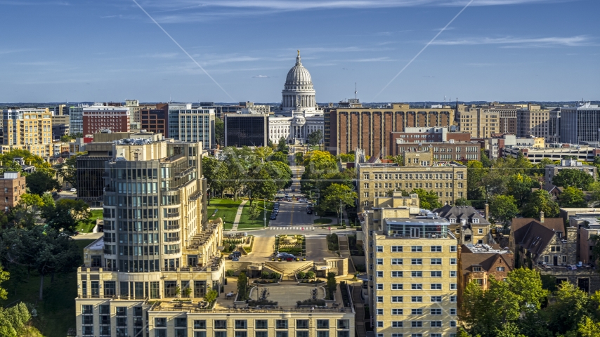 Apartment buildings and the capitol building, seen from hotel in Madison, Wisconsin Aerial Stock Photo DXP002_160_0002 | Axiom Images