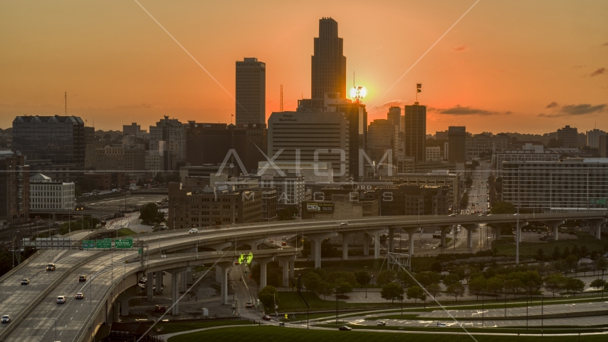 The skyline with the setting sun in background, Downtown Omaha, Nebraska Aerial Stock Photo DXP002_172_0011 | Axiom Images