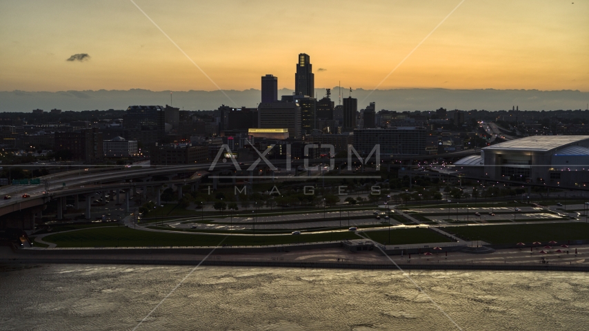A view of the skyline from the river at twilight, Downtown Omaha, Nebraska Aerial Stock Photo DXP002_172_0015 | Axiom Images